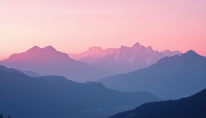 Fototapeta premium Morning fog envelops the majestic mountain range with layers of misty clouds at sunrise
