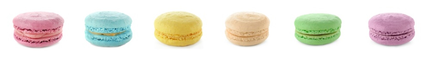Set of different sweet macarons on white background