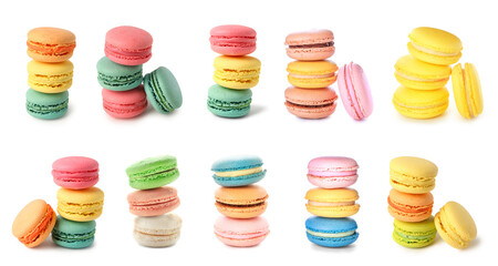 Set of many different sweet macarons on white background