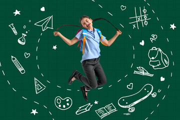Jumping little schoolgirl on white background