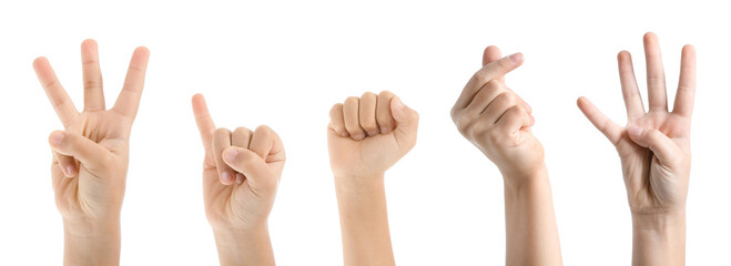 Set of children's hands showing gestures on white background