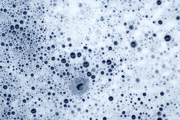 Top view of soap bubbles in the container