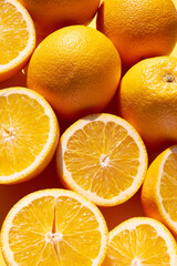 Orange fruits on a orange back