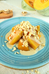 Turkish Pumpkin Dessert with Tahini and Walnut on Plate