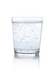 Refreshing soda water in glass isolated on white