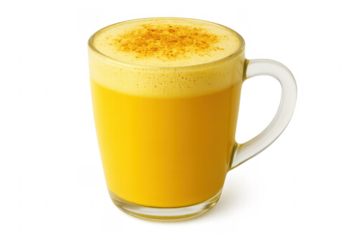 Golden milk turmeric latte with cinnamon in a transparent glass mug