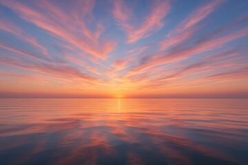 Breathtaking ocean sunset with cotton candy clouds reflecting golden and purple hues on calm waters