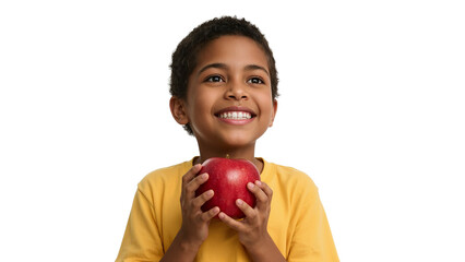 Young boy joyfully presenting a vibrant red apple against a black backdrop