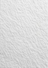 Close-up view of a textured white surface with subtle, wavy ridges