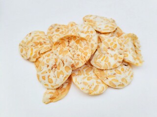 Close-up of tempeh chips on a white background. High angle view. 