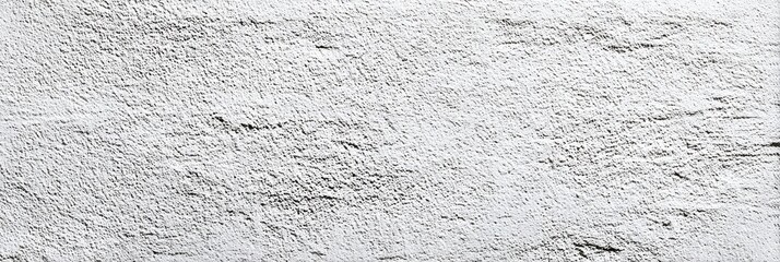 Close-up view of a textured, light gray surface with subtle, irregular patterns