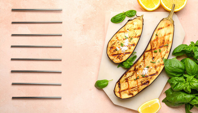 Grilled Eggplant Delight: Two halves of grilled eggplant, arranged alongside vibrant basil leaves and slices of lemon, offer a tempting snapshot of fresh ingredients.
