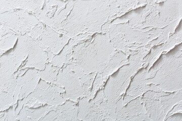 Textured white plaster wall, intricate patterns