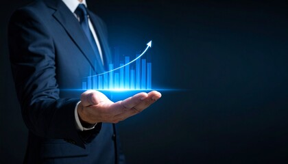 A man in a suit has one hand outstretched against a dark background, with a glowing, rising blue line chart on his hand