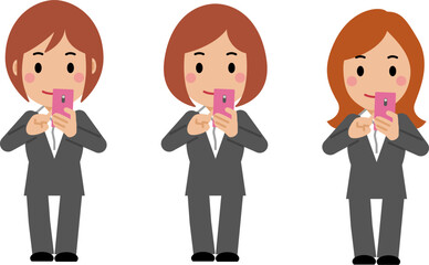 スマホを操作するグレースーツの若い女性