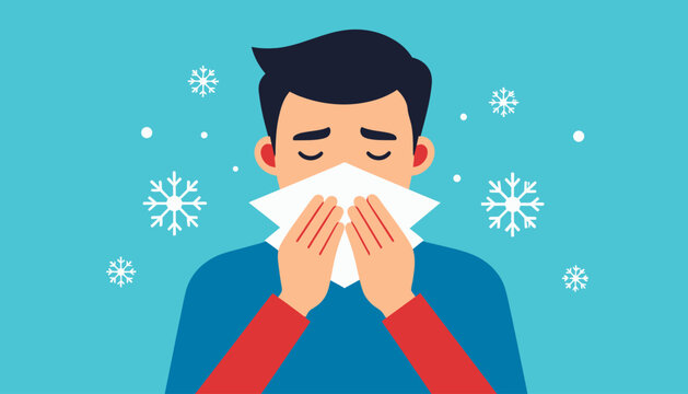 Man blowing nose in winter season.