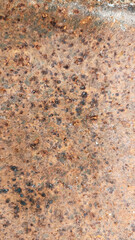 Close-up of vertical rusty corrugated metal with patina and decay textures, ideal for grunge design, background elements, or weathered industrial overlays in architectural compositions.