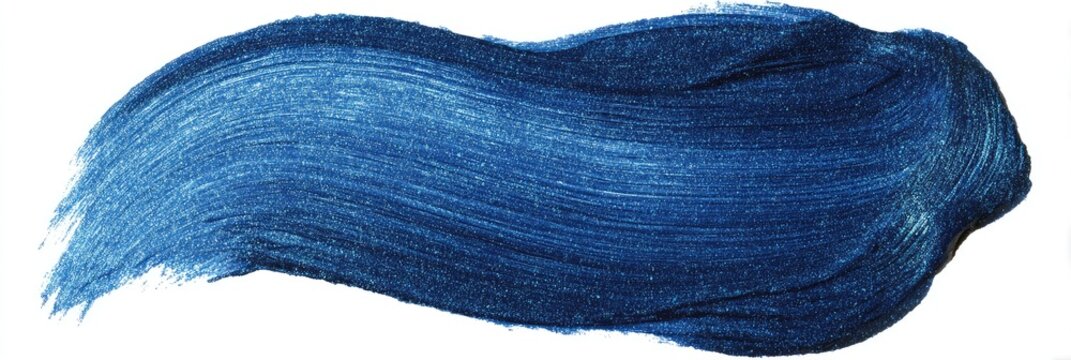 A bold, textured brushstroke of deep blue paint