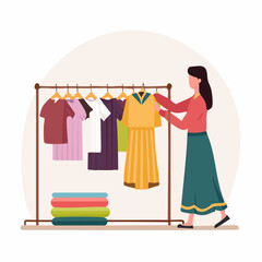 Obraz premium Woman browsing through clothes on a clothing rack with various garments.
