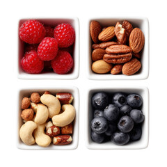 Assorted fresh berries and nuts in small bowls isolated on transparent background