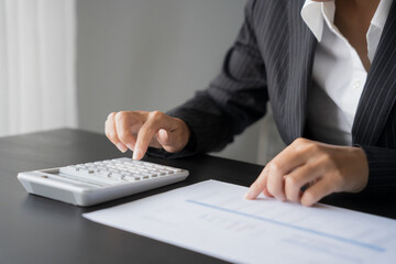 business man Auditor or internal revenue service staff checking annual financial statements company...