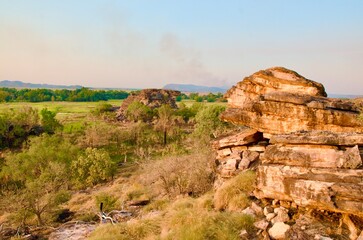 Overlooking the flood plains of the East Alligator River into Arnehm Land from Ubirr in Kakadu NP north of Cahills Crossing during the burn off season © Helge