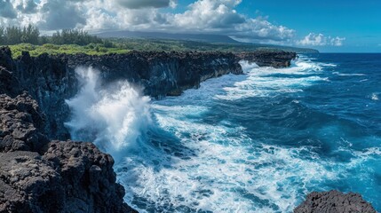 Fototapeta premium A dramatic coastal scene showcases a rugged, black lava cliff face violently crashing with powerful waves. White clouds fill the sky above, partially obscuring the sun. 