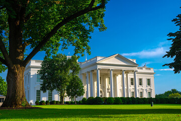 White House in Washington DC. America president residence. White House with national flag. American...
