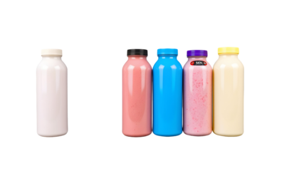 Assortment of colorful fruit smoothies in bottles