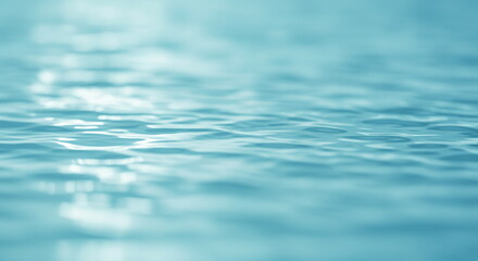 Abstract Blue Water Surface with Ripples and Light Reflections