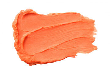 Creamy orange lipstick swatch revealing vibrant color, showcasing smooth texture against transparent backdrop for makeup design