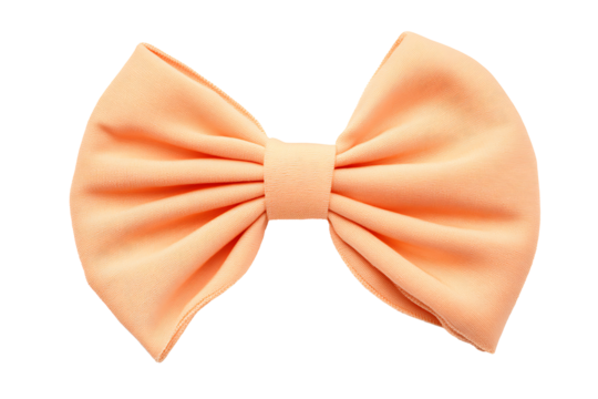 Peach fabric bow tied in symmetrical loops, isolated 