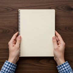 Obraz premium Hands holding notebook