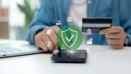 Secure online payment concept with credit card and digital security shield icon. Safe e-commerce transaction, fintech protection, cyber security and online banking technology.