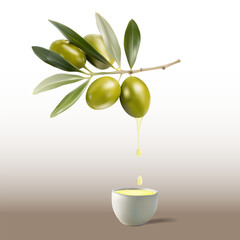 Fresh green olives on a branch with leaves and a drop of olive oil falling into a white ceramic bowl.