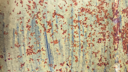 Old corrugated zinc fence wall with rusty surface, peeling textures, and vintage feel. Industrial metal background great for rustic design, retro grunge projects, or urban decay themes.