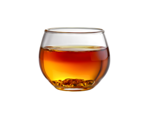 A steaming glass filled with warm tea