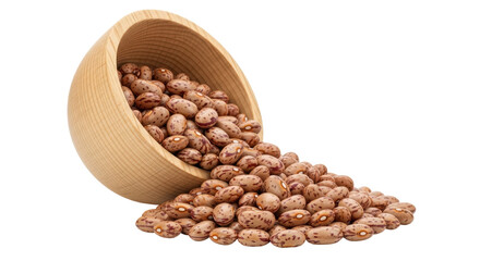 Isolated Pinto Beans spilling from Wooden Bowl