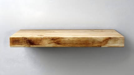 A rustic wooden shelf is mounted on a gray textured wall, providing a simple and natural display surface.