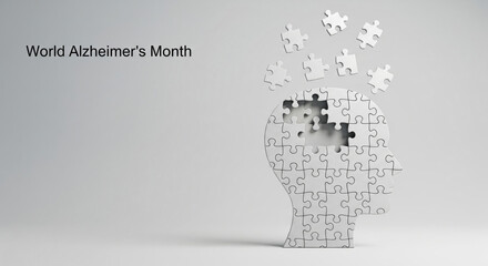 World Alzheimer Month awareness concept, human head silhouette made of puzzle pieces with some pieces missing, symbolizing memory loss and cognitive decline, on light background