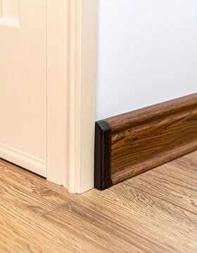 Interior corner baseboard trim