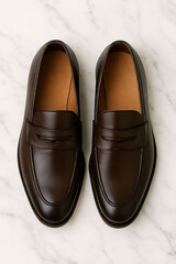 Elegant Brown Leather Loafers on Marble Surface