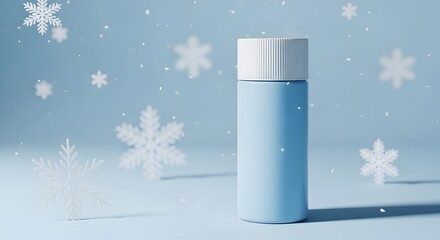 Light blue insulated water bottle with snowflakes against a soft blue background