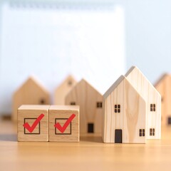Wooden House Models & Checklist on Desk