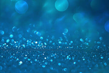 Abstract shimmering blue bokeh lights on a dark background creating a magical and sparkling festive atmosphere