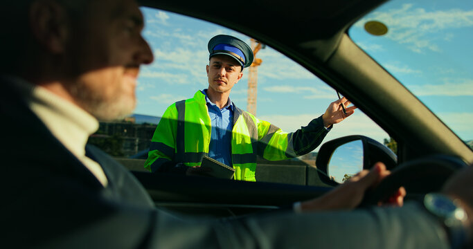 Window, police officer and stop with man in car for sobriety checkpoint, traffic violation and inspection. Roadside patrol, vehicle registration and legal compliance with people for law enforcement