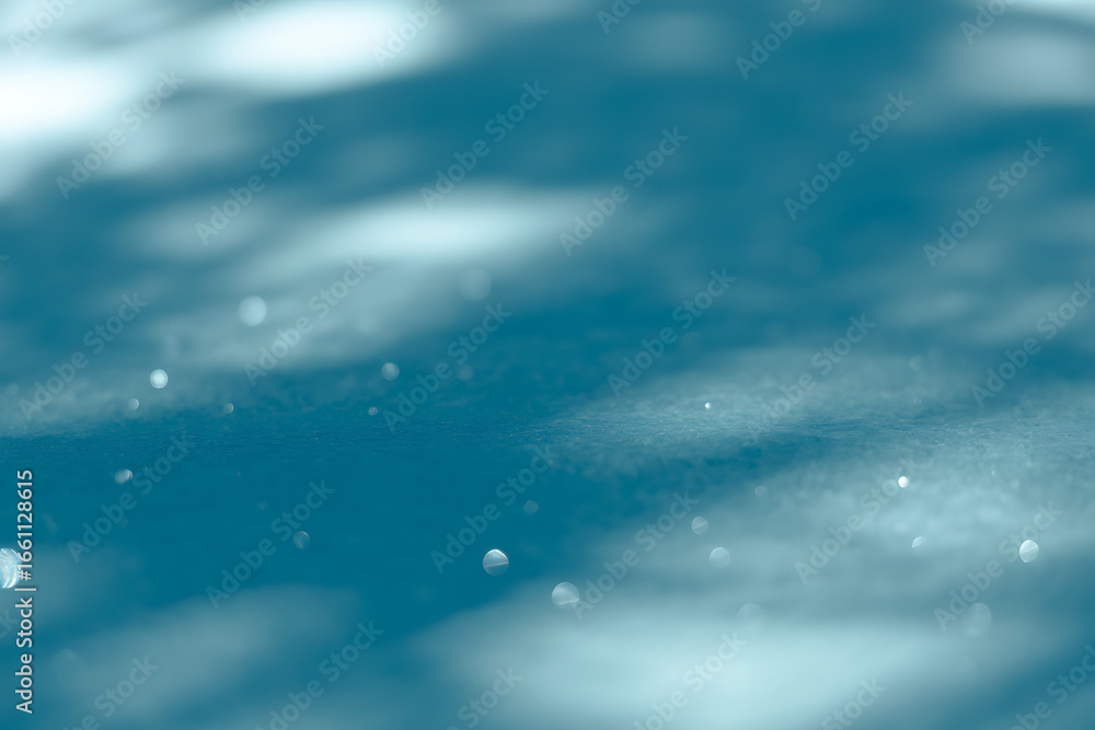 Aufkleber abstract blue and white bokeh background with sparkling light particles creating a dreamy and ethere