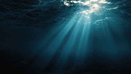 Sunlight beams through dark underwater depths (2)