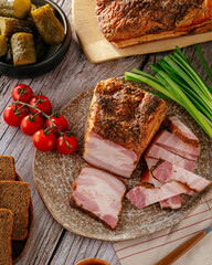 smoked lard with herbs and tomatoes