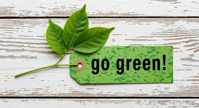 Go green tag with leaves on white rustic wood background